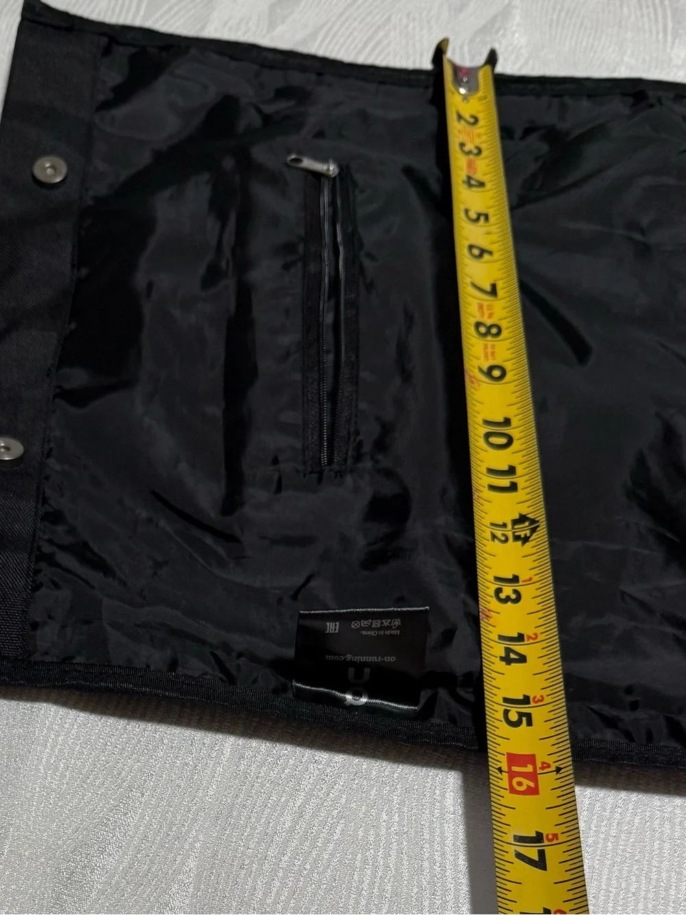 On Running Black Roll-Top Backpack with White Logo